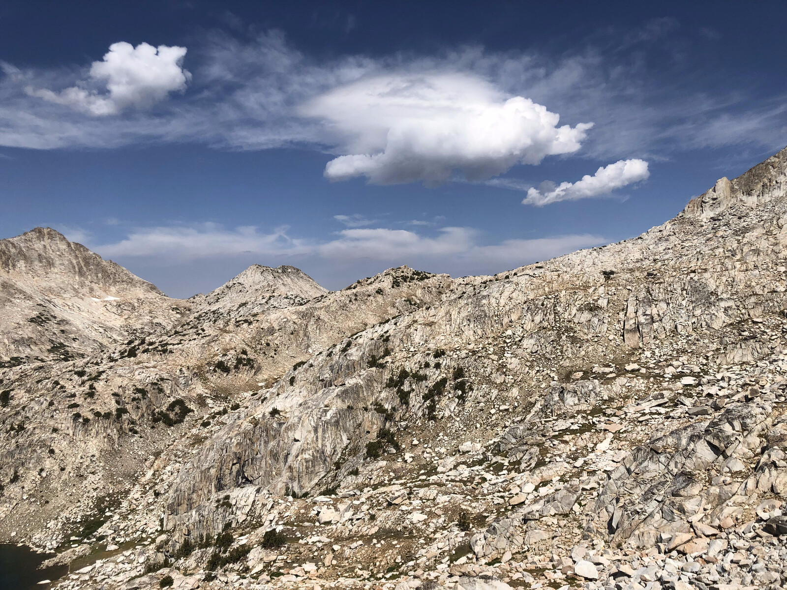 Shout of Relief Pass, the minor notch to the right of the peak at center