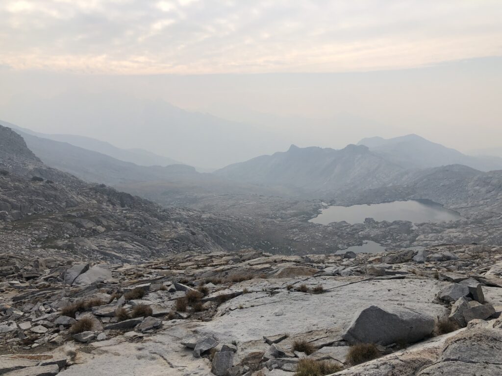 distant mountains obscured by smoke